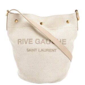 Saint Laurent Rive Gauche Bucket Bag in Sea Salt. Crossbody or shoulder bag.